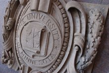 Close up of regents seal on a building
