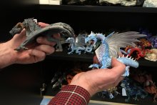Two plastic dragon figurines