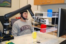 Research subject fitted with a noninvasive brain cap