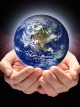 Earth being held in hands