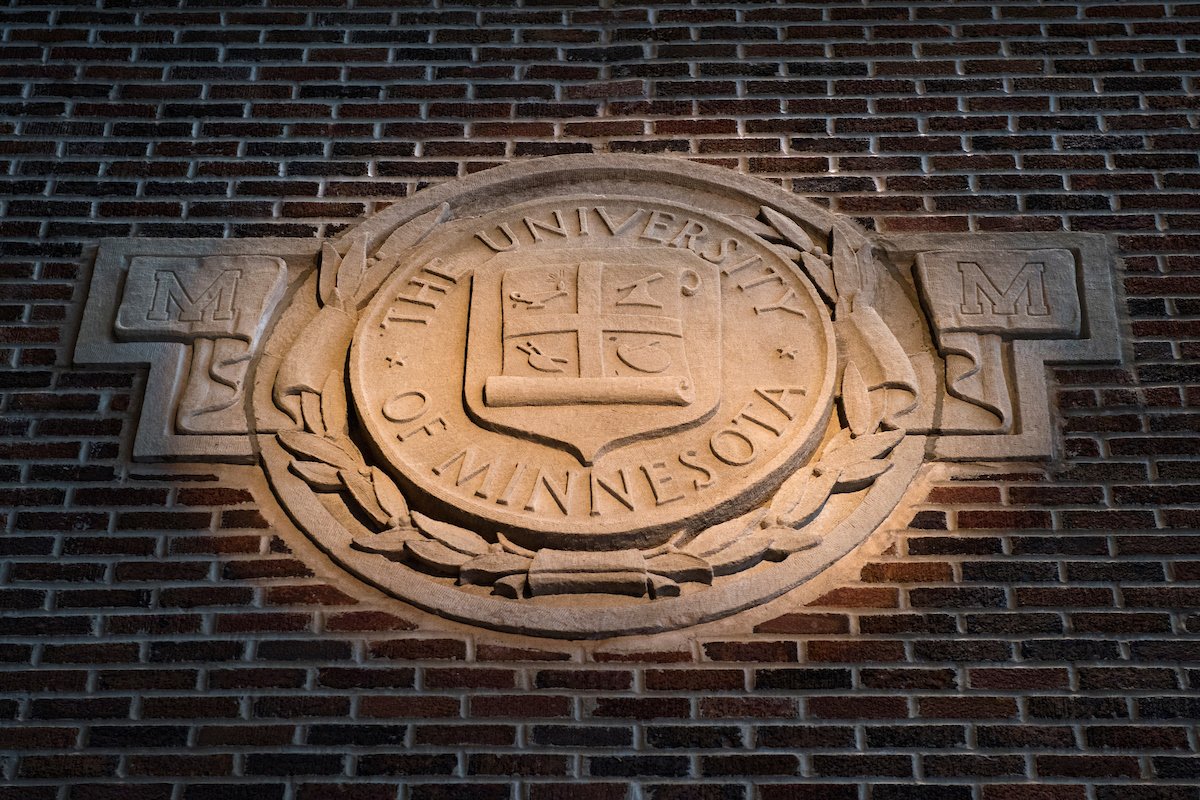 University of Minnesota seal on a building
