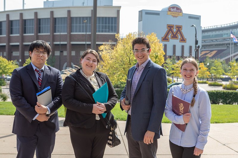 Four students outside the career fair