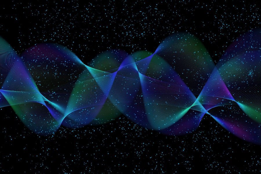 Particles in wave form in blue, green, and black