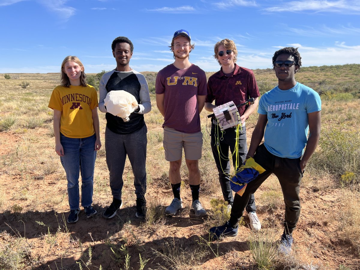 (Left to Right) Jasmine, Yoel, Ethan, Ashton, and Seyon pose with the recovered payloads. 