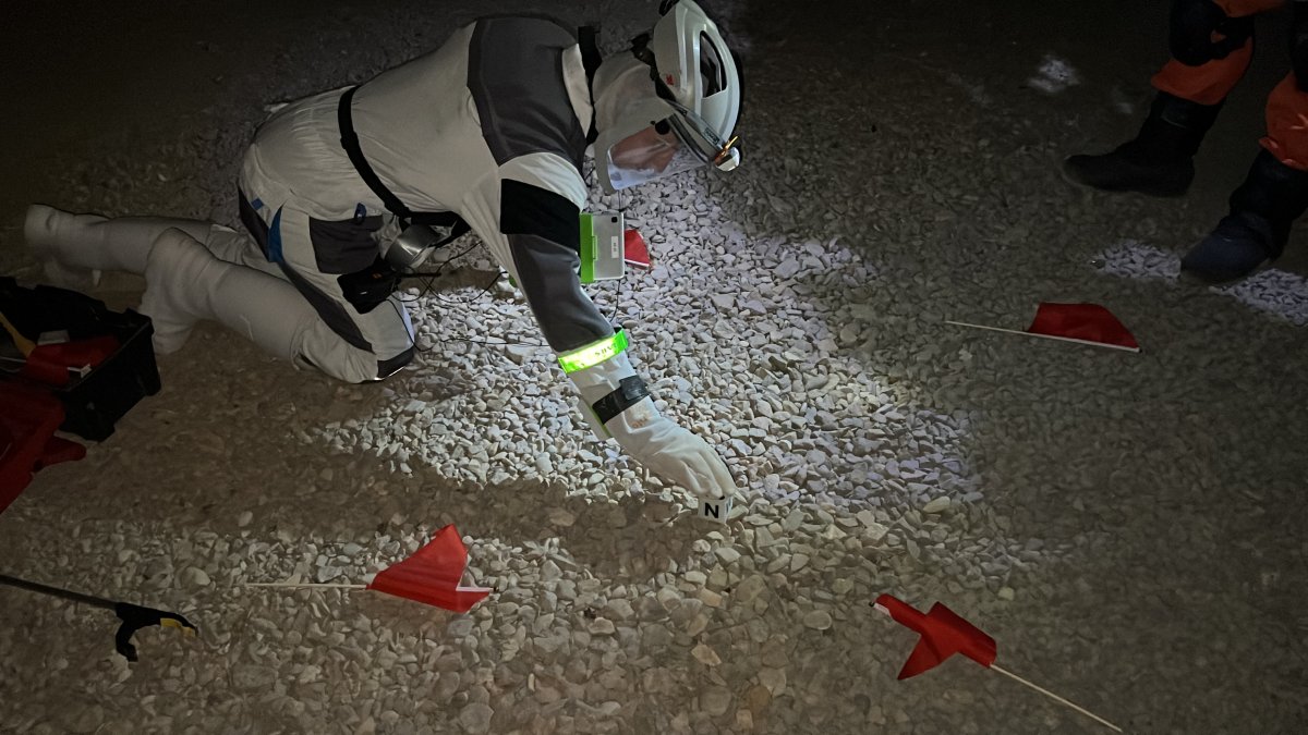 Donovan Magney collecting samples during an extravehicular activity project (EVA) in the LunAres Analog Astronaut Mission.