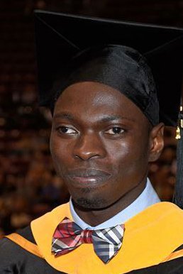 Joseph Ogega in his graduation cap and gown.