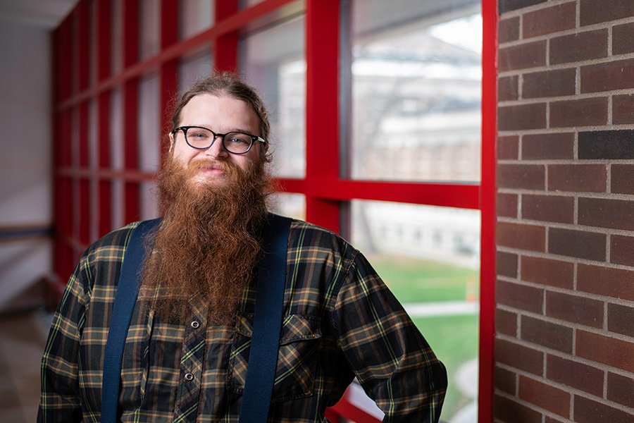 Daniel Kluver poses in Keller Hall