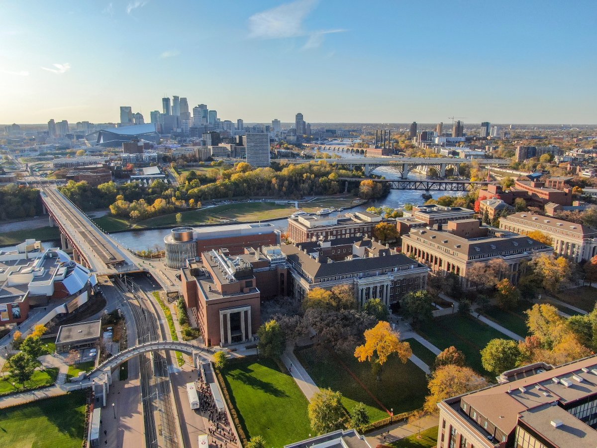 Overhead shot of Minneapolis campus, the Mississippi River, and downtown Minneapolis