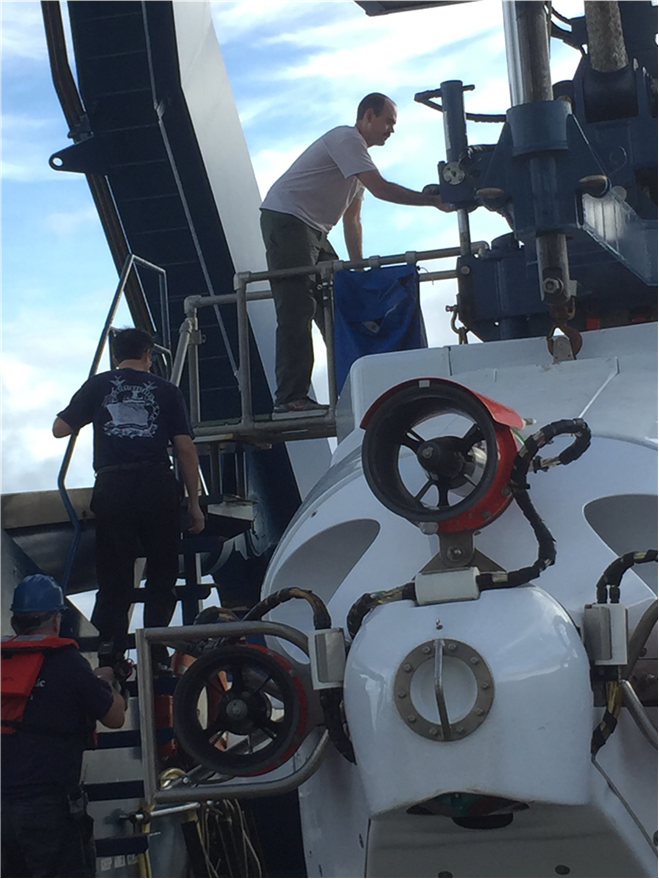 Peter Scheuermann, aqueous geochemistry graduate student (Ph.D. 2020) ascending stairs for first dive in DSRV Alvin at 9°N on the East Pacific Rise.