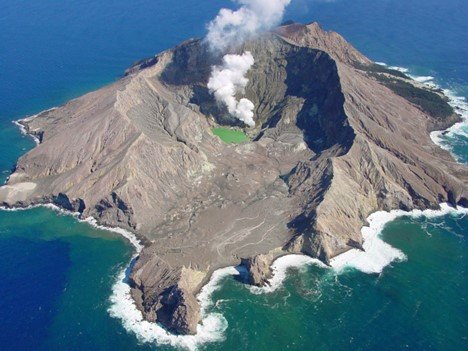 White Island is an unusually active and emerging strato-volcano, approximately 30 miles off the coast of the North Island of New Zealand
