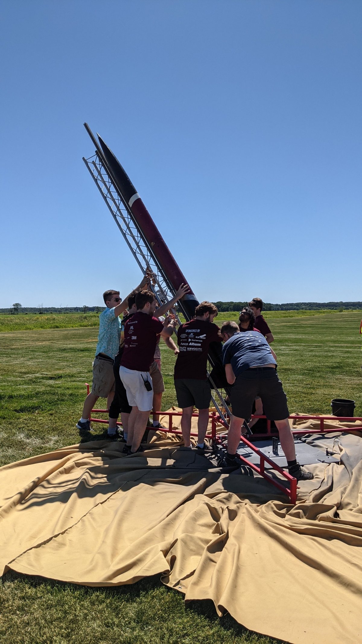 Rocket team raising their rocket
