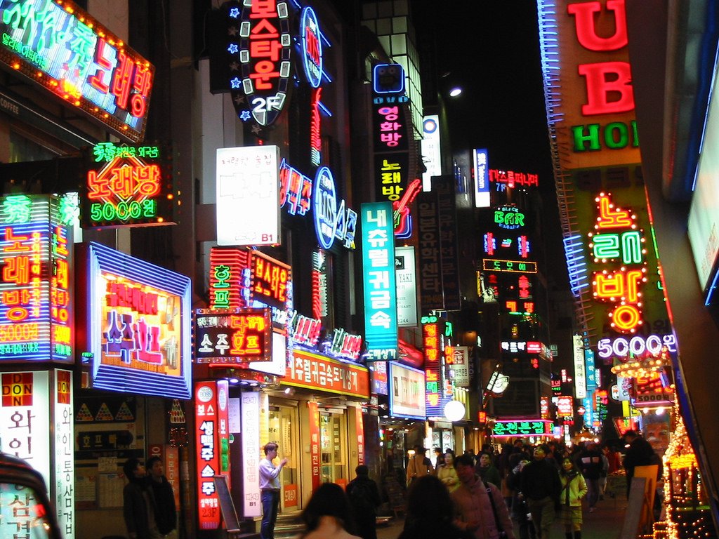 Nighttime in Seoul, aglow with neon lights.