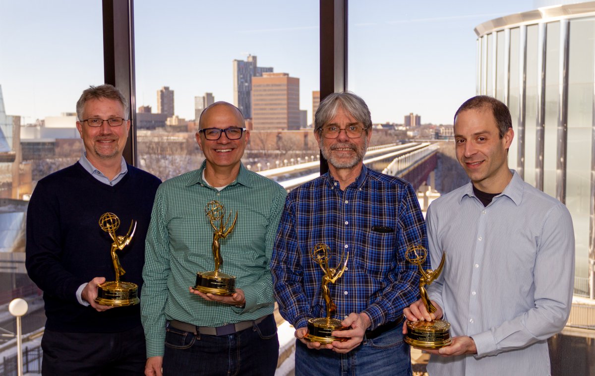 Professors Frank Bates, David Blank,  Marc Hillmyer, and Aaron Massari with their Emmy awards