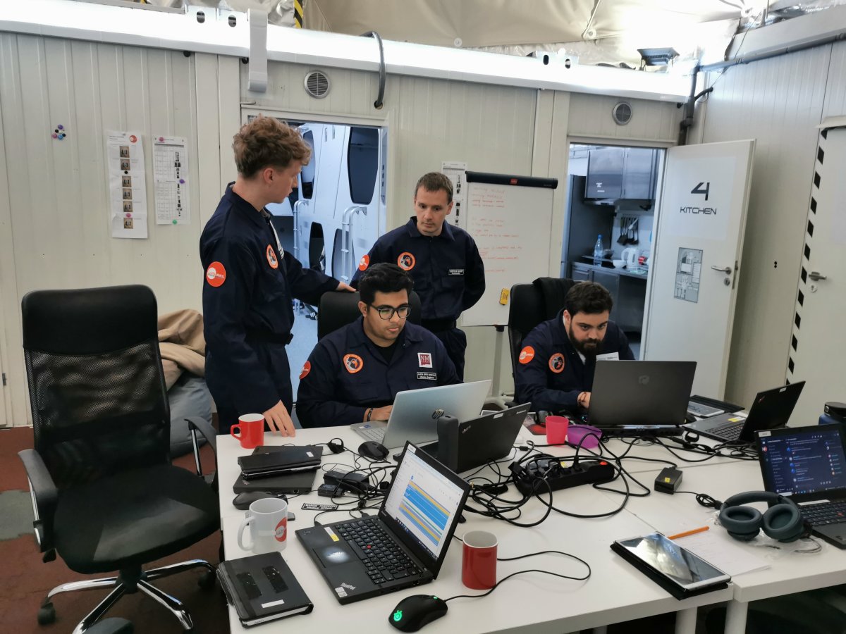 Students working on computers during a LunAres Analog Astronaut Mission.