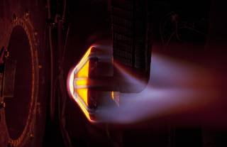 The Arc Jet Complex at NASA’s Ames Research Center in California’s Silicon Valley conducts heat simulation testing on a conceptual heat shield prototype.