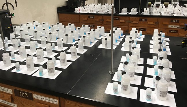 preparing chemicals for lab kits