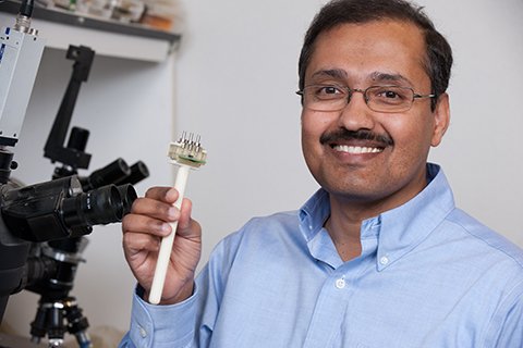 Rajesh Rajamani, professor of mechanical engineering in lab