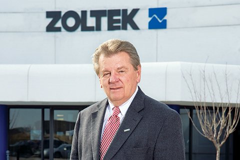 Zsolt Rumy in front of his office building