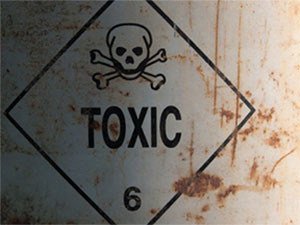 Toxic sign on metal can