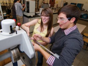 Two students working together in a lab