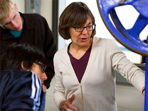 mechanical engineering professor Susan Mantell showing research to students