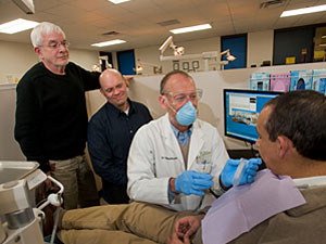 Researchers (l to r) John Carlis, Timothy Griffin, and Nelson Rhodus have made strides toward a simple "spit test" for cancer