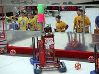 kids watching a robot competition