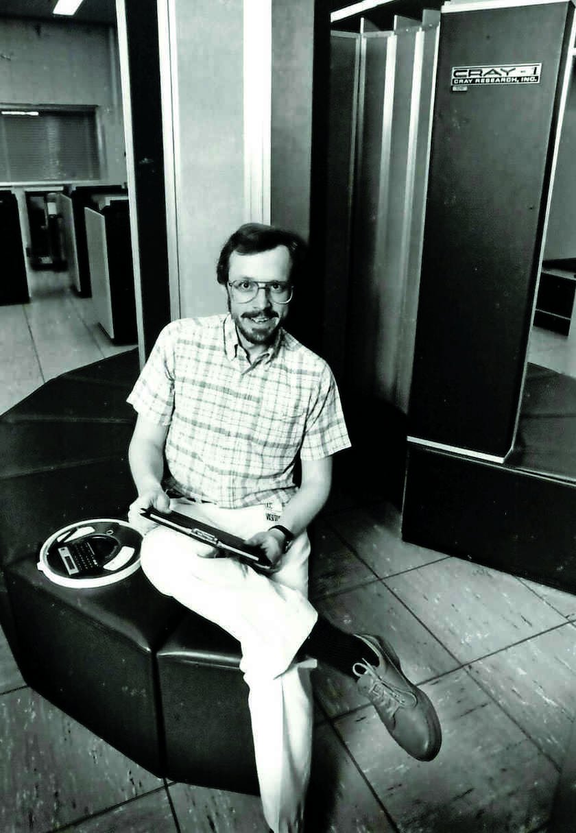 Circa early 1980s: Professor Donald Truhlar sitting on the University of Minnesota Cray-1 supercomputer. 